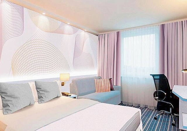 Blick in eines der neuen Hotelzimmer. (Visualisierung zvg.)